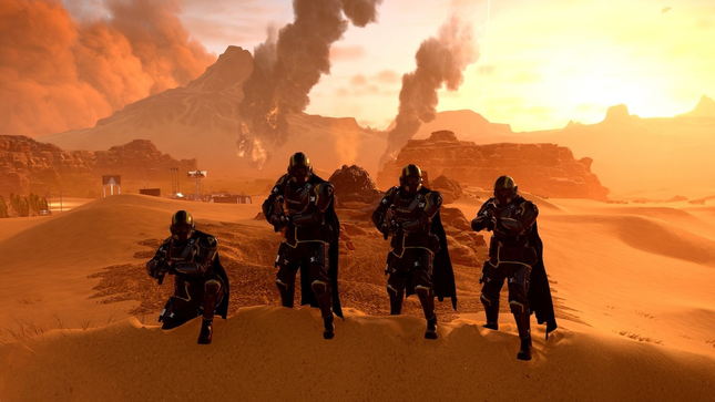 A group of four Helldivers stand in a desert